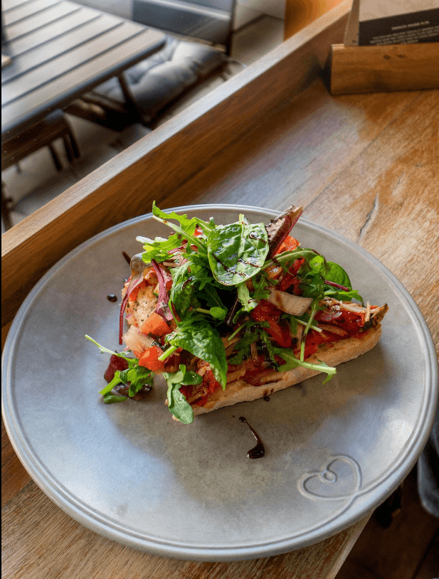 Signature toast with toppings at Bridge St Coffee