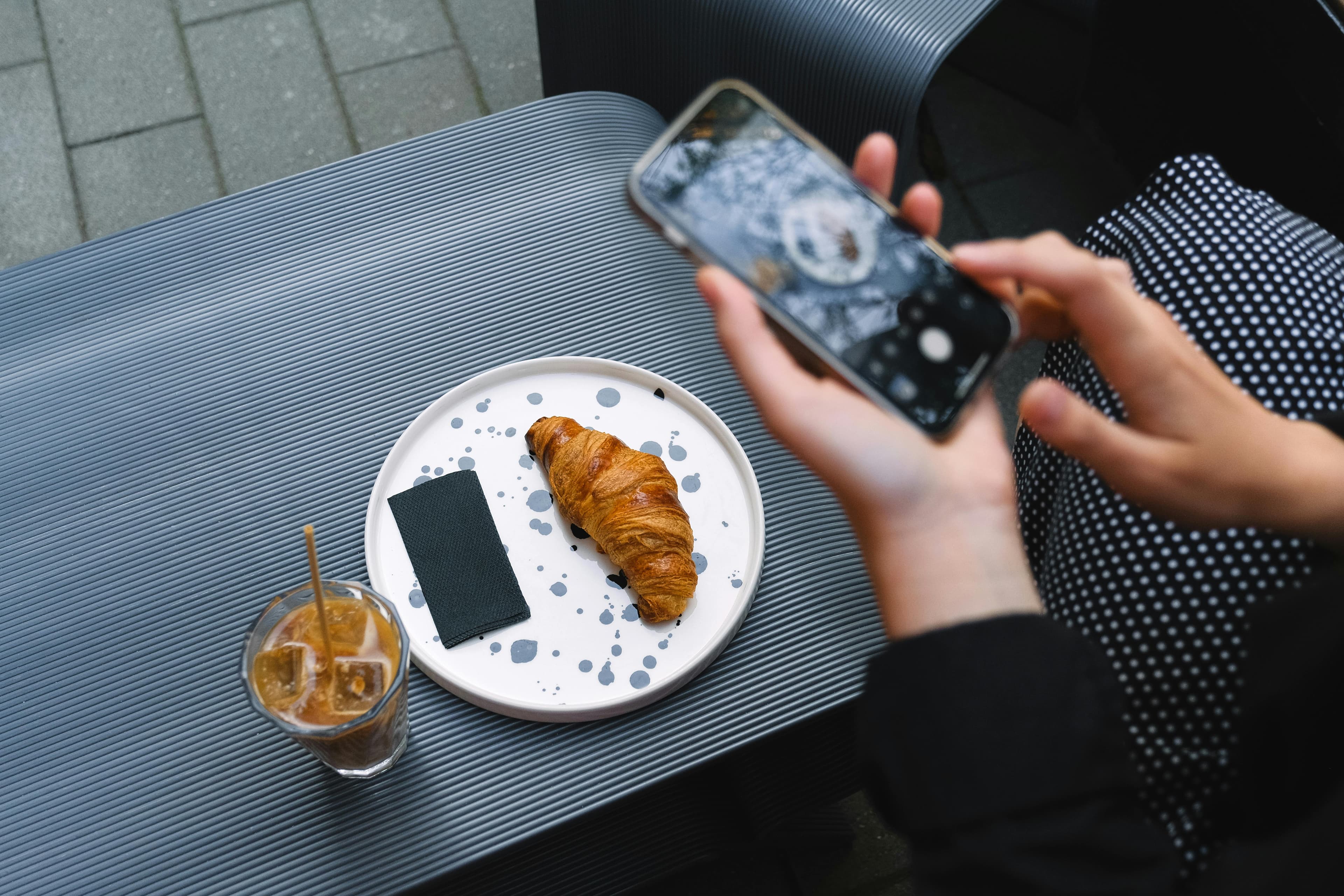 Croissant and iced coffee at a café in Chester city centre